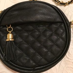 Urban Expressions round purse. Black